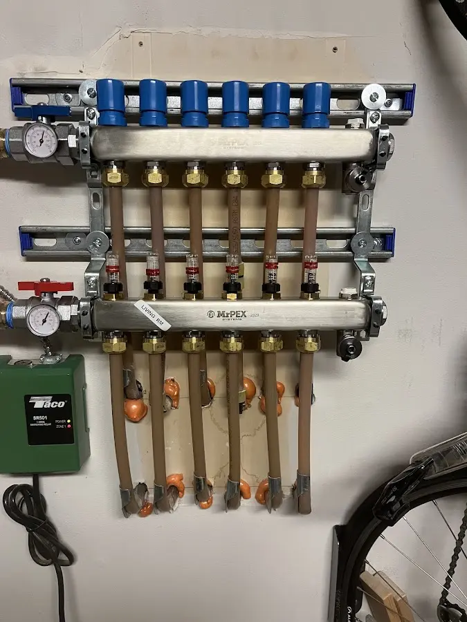 Plumber performing Water Heater Repair at a residential property in Santa Rita Ranch